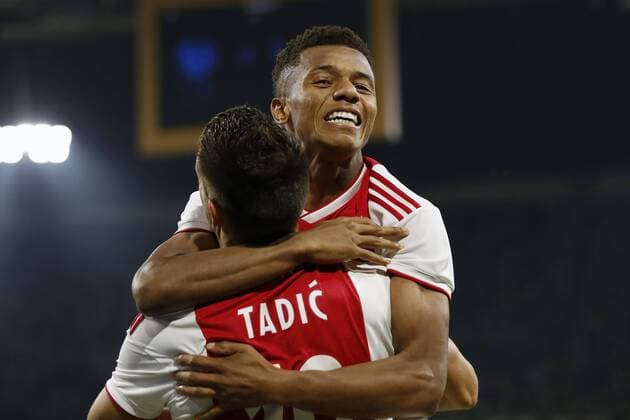 (L-R) Dusan Tadic of Ajax, David Neres of Ajax during the UEFA Champions League third round qualifying second leg match between Ajax Amsterdam and Royal Standard de Liege at the Johan Cruijff Arena on August 14, 2018 in Amsterdam, The Netherlands UEFA Champions League 2018 2019 xVIxVIxImagesx xMauricexvanxSteenxIVx 11777495