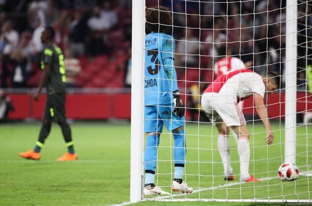 Standard s Guillermo Ochoa looks dejected during a soccer game between Dutch club AFC Ajax and Belgian team Standard de Liege, Tuesday 14 August 2018 in Amsterdam, the Netherlands, the return leg of the third qualifying round of the UEFA Champions League. The first leg resulted in a 2-2 draw. VIRGINIExLEFOUR  x05405906x