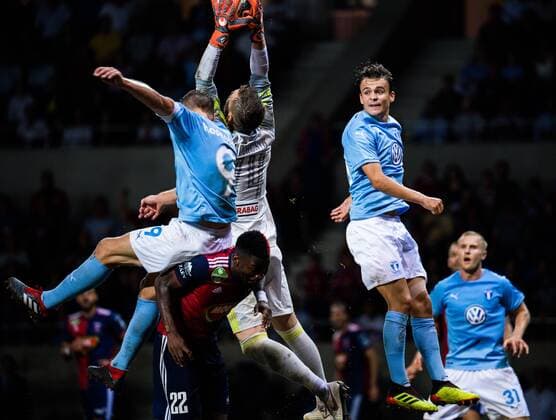180814 goalkeeper Stefan Scepovic or Vidi with a save infront of Markus Rosenberg and Andreas Vindheim of Malmö FF during the UEFA Champions League qualifying match between Vidi and Malmö FF on August 14, 2018 in Felcsut Photo Ludvig Thunman BILDBYR N code LT 35516  Copyright: LUDVIGxTHUNMAN BB180814LT121
