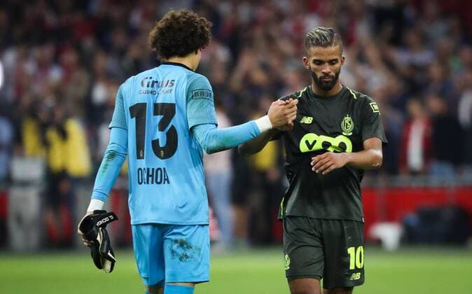 Standard s Guillermo Ochoa and Standard s Mehdi Carcela look dejected after a soccer game between Dutch club AFC Ajax and Belgian team Standard de Liege, Tuesday 14 August 2018 in Amsterdam, the Netherlands, the return leg of the third qualifying round of the UEFA Champions League. The first leg resulted in a 2-2 draw. VIRGINIExLEFOUR  x05405932x
