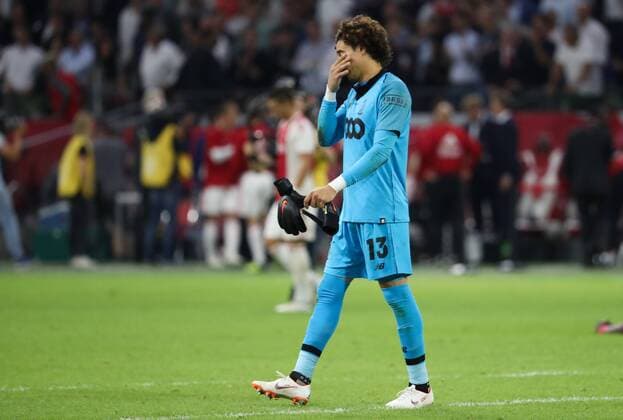 Standard s Guillermo Ochoa looks dejected after a soccer game between Dutch club AFC Ajax and Belgian team Standard de Liege, Tuesday 14 August 2018 in Amsterdam, the Netherlands, the return leg of the third qualifying round of the UEFA Champions League. The first leg resulted in a 2-2 draw. VIRGINIExLEFOUR  x05405943x