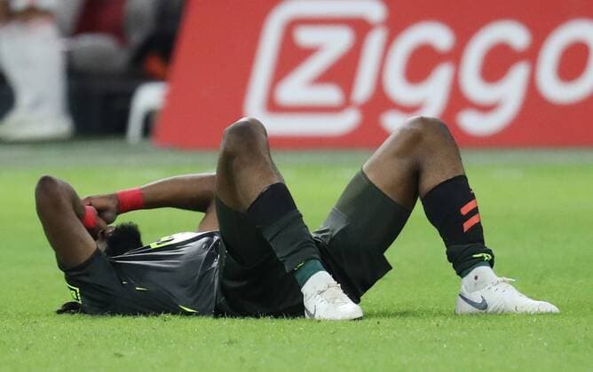 Standard s Christian Luyindama Nekadio looks dejected after a soccer game between Dutch club AFC Ajax and Belgian team Standard de Liege, Tuesday 14 August 2018 in Amsterdam, the Netherlands, the return leg of the third qualifying round of the UEFA Champions League. The first leg resulted in a 2-2 draw. VIRGINIExLEFOUR  x05405944x