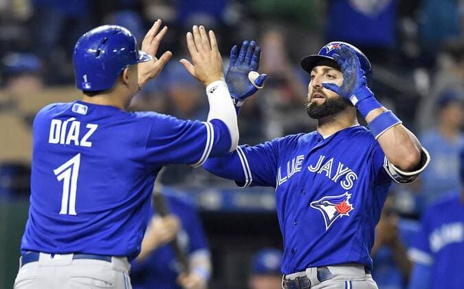 August 14, 2018 - Kansas City, MO, USA - The Toronto Blue Jays Kevin Pillar, right, is congratulated by Aledmys Diaz after Pillar hit a two-run home run in the eighth inning against the Kansas City Royals on Tuesday, Aug. 14, 2018, at Kauffman Stadium in Kansas City, Mo. The Blue Jays won, 6-5. Toronto at Kansas City - ZUMAm67_ 20180814_zaf_m67_063 Copyright: xJohnxSleezerx
