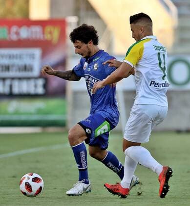 SOCCER - EL, Larnaca vs Sturm LARNACA,CYPRUS,16.AUG.18 - SOCCER - UEFA Europa League, AEK Larnaka vs SK Sturm Graz. Image shows Philipp Hosiner (Sturm) and Joan Truyols (Larnaca). GEPAxpictures xM.xOberlaender