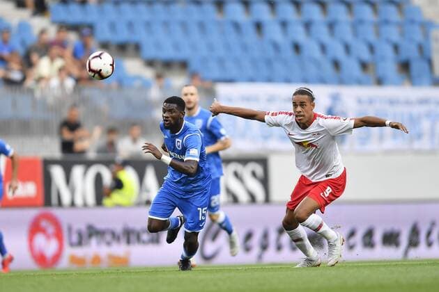 U Craiova 1984 Club Sportiv - RB Leipzig RB Leipzig s yussuf Poulsen in action against Universitatea Craiova s Isaac Donkor during UEFA Europa League 2018 2019, Third Qualifying Round, 2st leg match between U Craiova 1984 Club Sportiv vs RB Leipzig on Ion Oblemenco Stadium, Craiova Romania, 16 August 2018 Copyright: xAlexxNicodimx