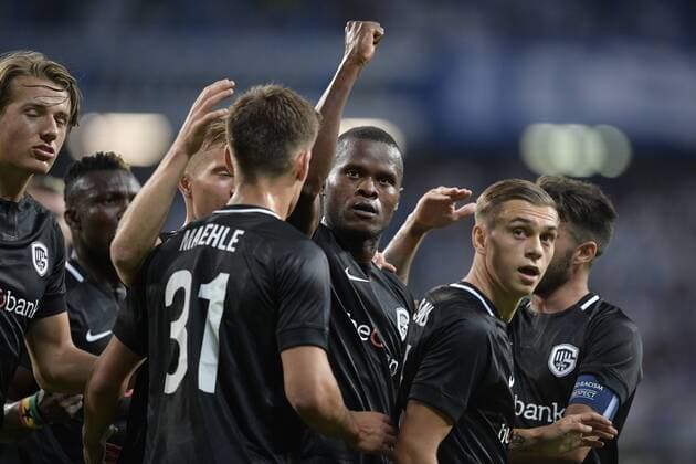 Genk s Aly Mbwana Samatta celebrates after scoring during a soccer game between Polish club Lech Poznan and Belgian team KRC Genk, Thursday 16 August 2018 in Poznan, Poland, the return leg of the third qualification round for the Europa League competition. YORICKxJANSENS  x05407064x