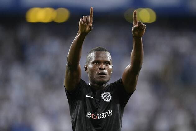 Genk s Aly Mbwana Samatta celebrates after scoring during a soccer game between Polish club Lech Poznan and Belgian team KRC Genk, Thursday 16 August 2018 in Poznan, Poland, the return leg of the third qualification round for the Europa League competition. YORICKxJANSENS  x05407065x