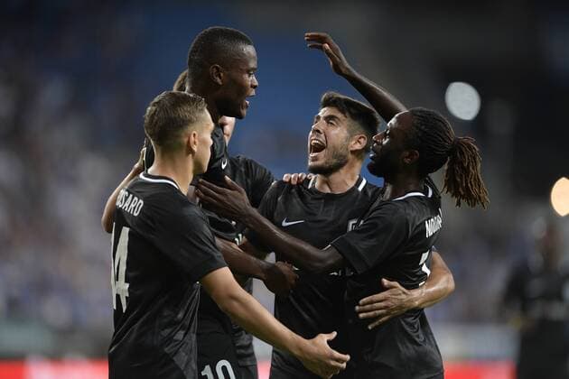 Genk s Aly Mbwana Samatta celebrates after scoring during a soccer game between Polish club Lech Poznan and Belgian team KRC Genk, Thursday 16 August 2018 in Poznan, Poland, the return leg of the third qualification round for the Europa League competition. YORICKxJANSENS  x05407041x