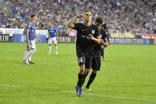 Genk s Leandro Trossard celebrates after scoring during a soccer game between Polish club Lech Poznan and Belgian team KRC Genk, Thursday 16 August 2018 in Poznan, Poland, the return leg of the third qualification round for the Europa League competition. YORICKxJANSENS  x05407106x