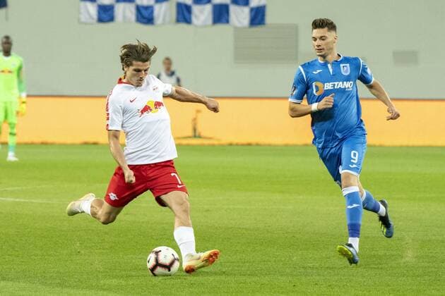 August 16, 2018: Marcel Sabitzer 7 of RB Leipzig and Andrei Burlacu 9 of Universitatea Craiova during the Soccer, UEFA Europa League qualifications, 3rd round, second leg, game between Universitatea Craiova (ROU) and RB Leipzig (GER) at Ion Oblemenco, Craiova, Romania ROU.  Copyright: xCatalinxSoarex crfcs16082018123642
