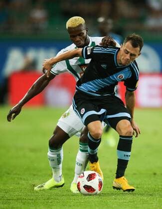 SOCCER - EL quali, Rapid vs Bratislava VIENNA,AUSTRIA,16.AUG.18 - SOCCER - UEFA Europa League qualification, SK Rapid Wien vs Slovan Bratislava. Image shows Boli Bolingoli-Mbombo (Rapid) and Dejan Drazic (Slovan). Keywords: Wien Energie. GEPAxpictures xPhilippxBrem
