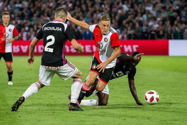 ROTTERDAM , 16-08-2018 , Stadium De Kuip , Football , Season 2018 2019 , Europa League , Third qualifying round , Feyenoord - Trencin , Feyenoord player Jens Toornstra (m) Trencin player Lukas Skovajsa (l) and Trencin player Reuben Yem during the the match Feyenoord - Trencin  x2401101x