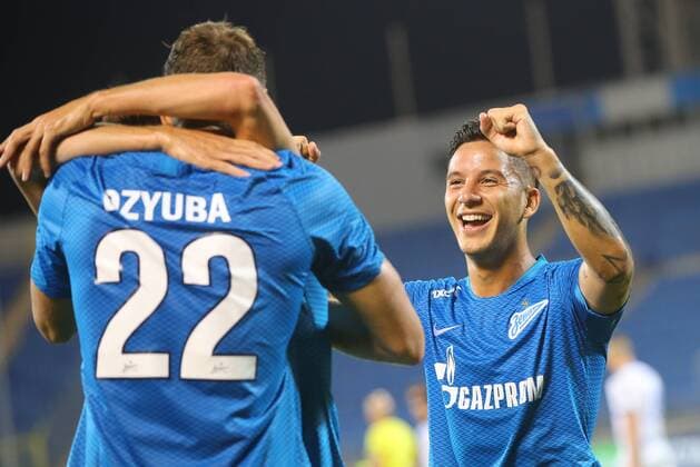 ST PETERSBURG, RUSSIA - AUGUST 16, 2018: Zenit St Petersburg s Artyom Dzyuba (L) and Sebastian Driussi celebrate victory in the 2018 19 UEFA Europa League third qualifying round Leg 2 match against Dinamo Minsk at Petrovsky Stadium. Peter Kovalev TASS  TS08D050