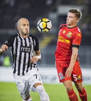 16th August 2018, Partizan Stadium, Belgrade, Serbia; Europa League football, third qualifying round 2nd leg, Partizan versus Nordsjaelland; Nemanja Miletic of Partizan challenges Mads Pedersen of Nordsjaelland for the high ball  ActionPlus12055909 NikolaxKrstic
