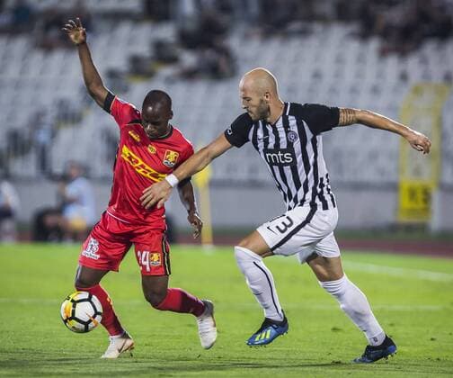 16th August 2018, Partizan Stadium, Belgrade, Serbia; Europa League football, third qualifying round 2nd leg, Partizan versus Nordsjaelland; Nemanja Miletic of Partizan challenges Jonathan Amon of Nordsjaelland  ActionPlus12055912 NikolaxKrstic