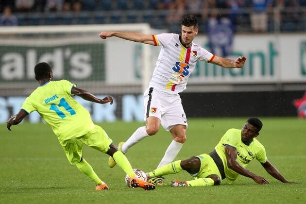 Gent s Jean-Luc Dompe, Jagiellonia s Nemanja Mitrovic and Gent s Taiwo Awoniyi fight for the ball during a soccer game between Belgian club KAA Gent and Polish team Jagiellonia Bialystok, Thursday 16 August 2018 in Gent, the return leg of the third qualification round for the Europa League competition. BRUNOxFAHY  x05407183x