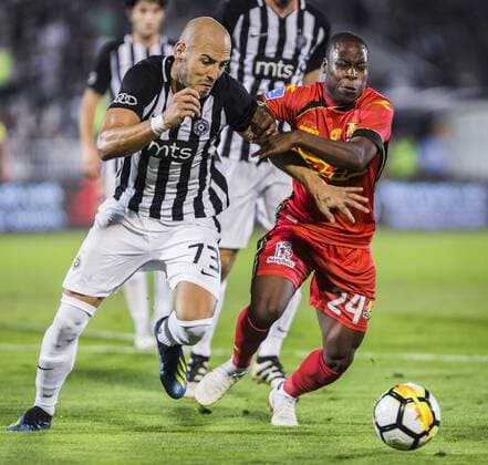 16th August 2018, Partizan Stadium, Belgrade, Serbia; Europa League football, third qualifying round 2nd leg, Partizan versus Nordsjaelland; Nemanja Miletic of Partizan challenges Jonathan Amon of Nordsjaelland  ActionPlus12055915 NikolaxKrstic