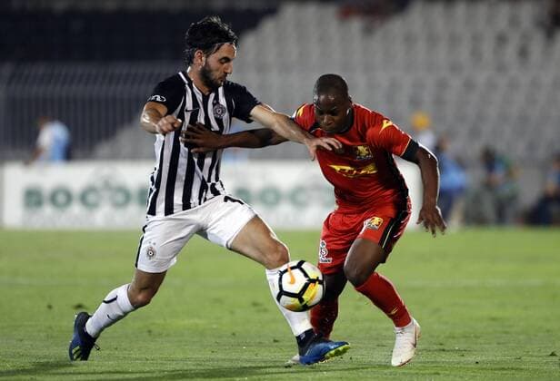 (180817) -- BELGRADE , Aug. 17, 2018 -- Partizan s Marko Jankovic (L) vies with Nordsjaelland s Jonathan Amon during UEFA Europa League third qualifying round, 2nd leg football match between Partizan and Nordsjaelland in Belgrade, Serbia on Aug. 16, 2018. Partizan won 3-2. ) (SP)SERBIA-BELGRADE-FOOTBALL-UEFA-EUROPA LEAGUE-QUALIFICATIONS PredragxMilosavljevic 