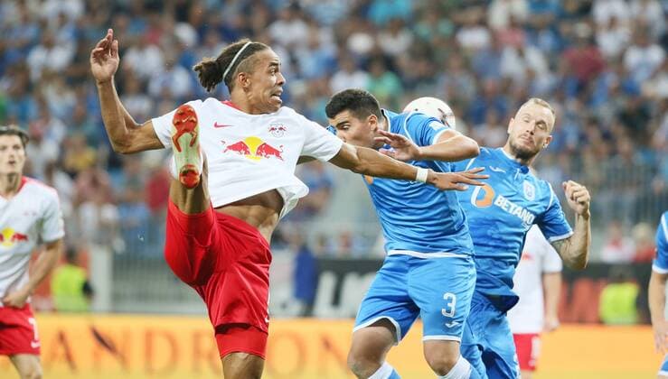 Craiova RB Leipzig Soccer Euro League Qualifiers Craiova 16 08 2018 Stadionul Ion Oblemenco Soccer UEFA Euro League Qualification 3 Round Return Match CS Universitatea Craiova vs. RB Leipzig 1 1 0 1 Pictured left Yussuf Poulsen 9 RB Leipzig Marius Briceag 3 Craiova and Matteo Fedele 20 Craiova