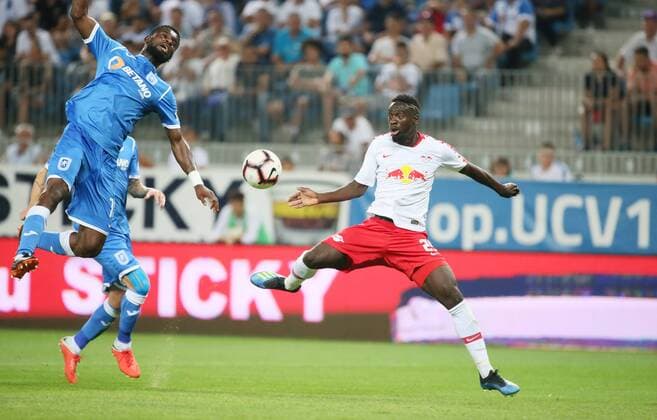 Craiova RB Leipzig Soccer Euro League Qualifiers Craiova 16 08 2018 Stadionul Ion Oblemenco Soccer UEFA Euro League Qualification 3 Round 2nd Leg CS Universitatea Craiova vs RB Leipzig 1 1 0 1 Pictured left Isaac Donkor 15 Craiova and Jean Kevin Augustin 29 RB Leipzig