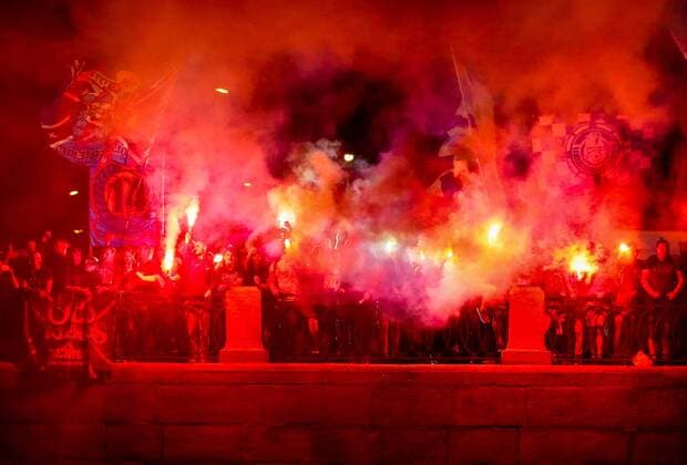 ST PETERSBURG, RUSSIA - AUGUST 16, 2018: Zenit St Petersburg fans set off flares at Petrovsky Stadium to celebrate the team winning Leg 2 of their 2018 19 UEFA Europa League third qualifying round match against Dinamo Minsk with a 8-1 score. Peter Kovalev TASS  TS08D055