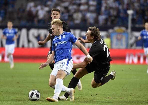 POZNAN,POLAND - AUGUST 16 : Kamil Jozwiak midfielder of Lech Poznan and Sander Boli Berge midfielder of KRC Genk pictured during the UEFA Europa League match,third qualifying round, 2 nd leg between KRC Genk and KKS Lech Poznan at the INEA Stadium on August 16, 2018 in Poznan, Poland 16 08 2018 FOOTBALL : KRC Genk vs KKS Lech Poznan - Ligue Europa Tour de Qualification - 16 08 2018 Photonews Panoramic 
