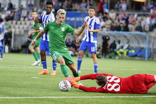 Stefan Savic of Olimpja Ljubljana and Maksim Rudakov of HJK during UEFA Europa League Third Qualifying Round second match HJK Helsinki vs Olimpja Ljubljana at Telia 5G Stadium in Helsinki Finland on 16th August 2018. Matti Raivio All Over Press XXKEIKKAXX  MR021188