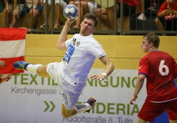 HANDBALL - EURO 2018, AUT vs CZE TULLN,AUSTRIA,19.AUG.18 - HANDBALL - EHF European Championship EM Europameisterschaft U18, international match Länderspiel AUT vs CZE, final. Image shows Marko Katic (AUT) and Alexandr Zamarski (CZE). GEPAxpictures xMarioxKneisl