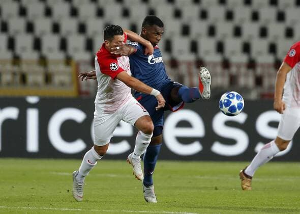 (180822) -- BELGRADE (SERBIA), Aug, 22, 2018 -- Salzburg s Zlatko Junuzovic (L) vies with Crvena Zvezda s Jonathan Cafu during the 1st leg of UEFA Champions League Play-offs football match between Crvena Zvezda and Salzburg in Belgrade, Serbia on Aug. 21, 2018. The match ended in a 0-0 draw. ) (SP)SERBIA-BELGRADE-FOOTBALL-UEFA-QUALIFICATION-CRVENA ZVEZDA VS SALZBURG PredragxMilosavljevic 