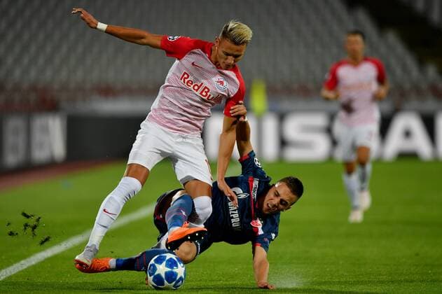 Sport Bilder des Tages SOCCER - CL quali, Belgrade vs RBS BELGRADE,SERBIA,21.AUG.18 - SOCCER - UEFA Champions League qualification play-off, FC Red Star Belgrade vs Red Bull Salzburg. Image shows Hannes Wolf (RBS) and Branko Jovicic (Belgrade). GEPAxpictures xFlorianxErtl