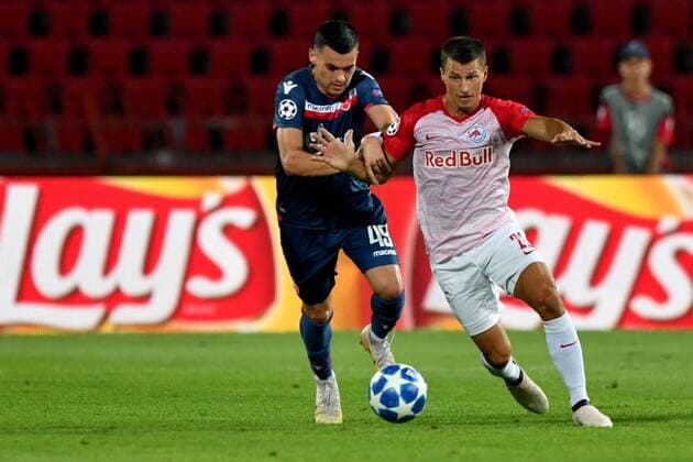 SOCCER - CL quali, Belgrade vs RBS BELGRADE,SERBIA,21.AUG.18 - SOCCER - UEFA Champions League qualification play-off, FC Red Star Belgrade vs Red Bull Salzburg. Image shows Nemanja Radonjic (Belgrade) and Stefan Lainer (RBS). GEPAxpictures xFlorianxErtl