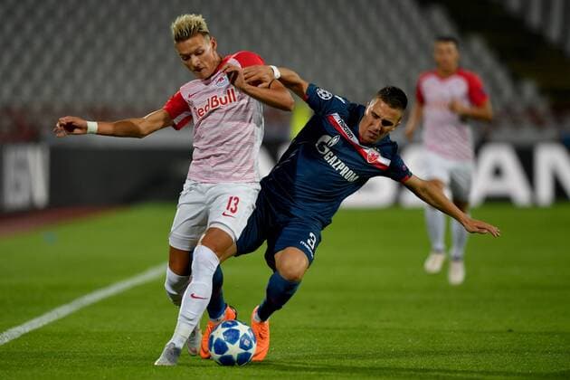 SOCCER - CL quali, Belgrade vs RBS BELGRADE,SERBIA,21.AUG.18 - SOCCER - UEFA Champions League qualification play-off, FC Red Star Belgrade vs Red Bull Salzburg. Image shows Hannes Wolf (RBS) and Branko Jovicic (Belgrade). GEPAxpictures xFlorianxErtl