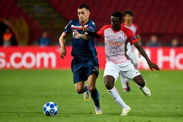 SOCCER - CL quali, Belgrade vs RBS BELGRADE,SERBIA,21.AUG.18 - SOCCER - UEFA Champions League qualification play-off, FC Red Star Belgrade vs Red Bull Salzburg. Image shows Nemanja Radonjic (Belgrade) and Amadou Haidara (RBS). GEPAxpictures xFlorianxErtl