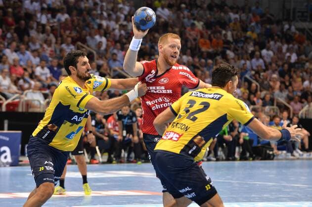 Handball Pixum Super Cup SG Flensburg Handewitt Rhein Neckar Löwen on 22 08 2018 at the ISS Dome in Dusseldorf Ilija Abutovic Rhine Neckar Löwen left Jim Gottfridsson Flensburg center Alexander Petersson Rhein Neckar Löwen right xTTx