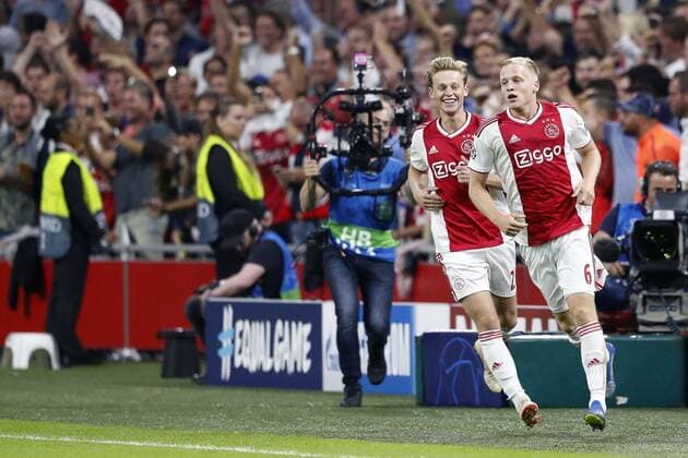 AMSTERDAM, Netherlands, 22-08-2018, football, season 2018 2019, Champions League Play-offs , Johan Cruijff ArenA , Ajax-player Donny van de Beek (R) celebrating with Ajax-player Frenkie de Jong (L) during the match Ajax - Dynamo Kiev . Ajax - Dynamo Kiev  x2413844x