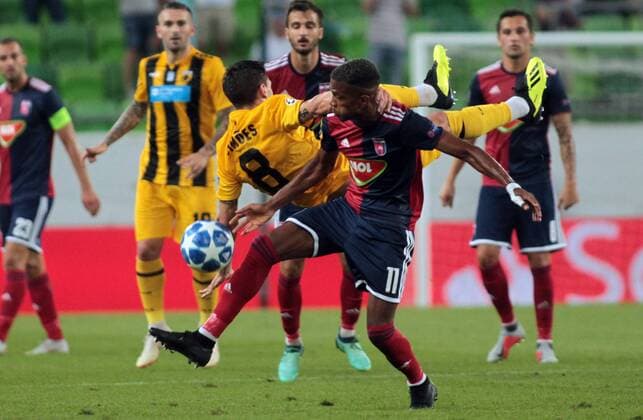 22.08.2018 Budapest(Hungary) FC Vidi-FC AEK Athens play off champions league men s football Andre Simoes (central behind) FC AEK Athens, Loic Nego(front) FC Vidi : 