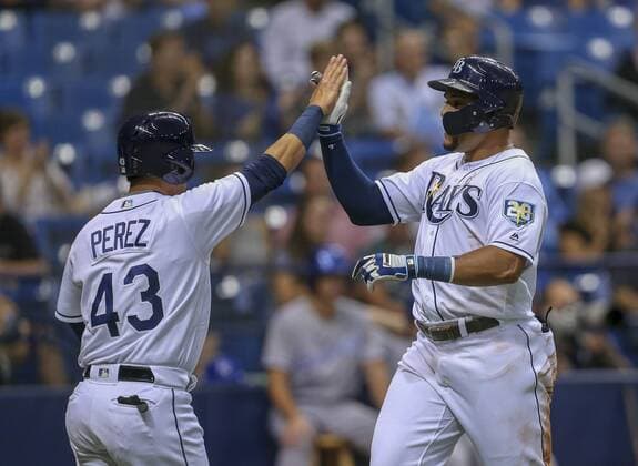 August 22, 2018 - St. Petersburg, Florida, U.S. - CHRIS URSO Times.Tampa Bay Rays right fielder Carlos Gomez (27), right, celebrates scoring along with Tampa Bay Rays catcher Michael Perez (43) on a single hit by Tampa Bay Rays shortstop Brandon Lowe (35) during the second inning against the Kansas City Royals Wednesday, Aug. 22, 2018 in St. Petersburg. Florida News - August 22, 2018 - ZUMAs70_ 85078855st Copyright: xChrisxUrsox