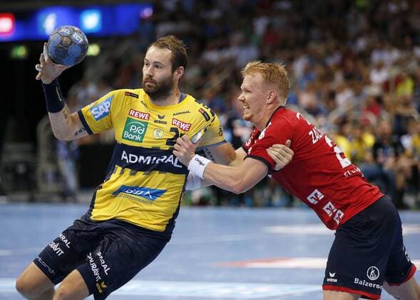 Handball Pixum Super Cup on 22 08 2018 at the ISS Dome Arena in Dusseldorf Rhein Neckar Lions vs SG Flensburg Handewitt 33 26 Steffen FÄTH RNL li defeats Anders ZACHARIASSEN SGF re