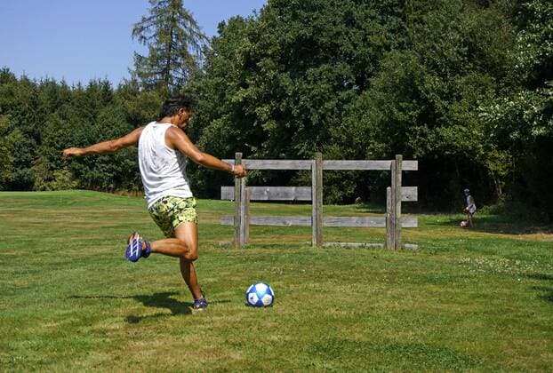 23 08 2018 Football Golf a sport and leisure fun for children and families On the golf course in Memmingen Allgäu Bernd Feil plays a round with the leather ball over a wooden obstacle MODEL RELEASED