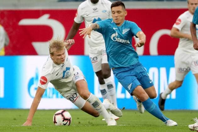 ST PETERSBURG, RUSSIA â€“ AUGUST 23, 2018: FC Molde s Erling Braut Haland (L) and FC Zenit St Petersburg s Matias Kranevitter in action in Leg 1 of their 2018â€“19 UEFA Europa League play-off round football match at Saint Petersburg Stadium. Alexander Demianchuk TASS  TS08DB7F