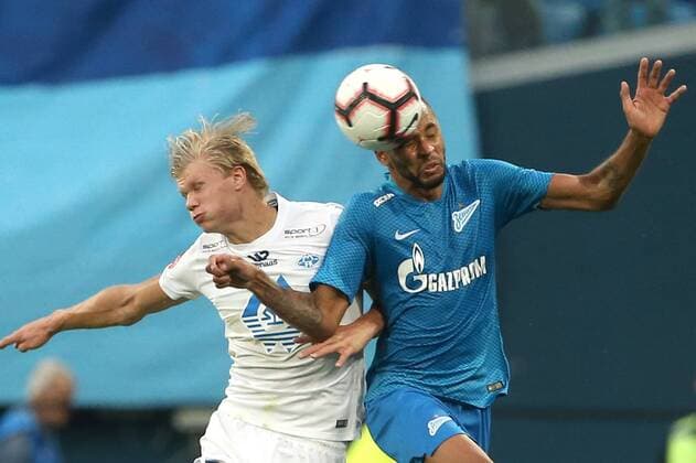 ST PETERSBURG, RUSSIA â€“ AUGUST 23, 2018: FC Molde s Erling Braut Haland (L) and FC Zenit St Petersburg s Hernani in action in Leg 1 of their 2018â€“19 UEFA Europa League play-off round football match at Saint Petersburg Stadium. Peter Kovalev TASS  TS08DBA7