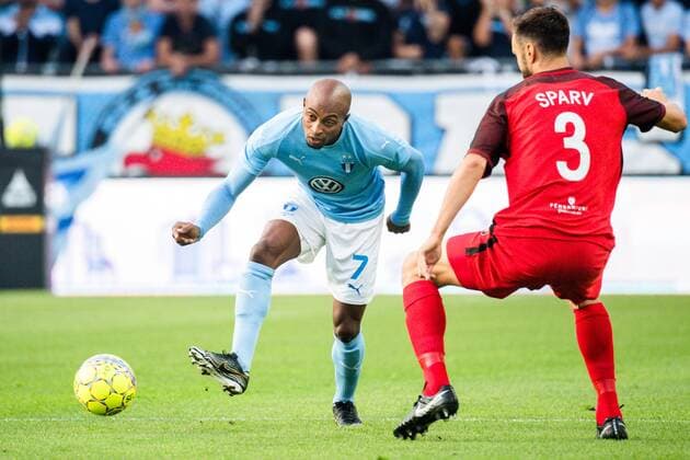 180823 Fouad Bachirou of Malmö FF and Tim Sparv of Midtjylland during the UEFA Europa League qualifying match between Malmö FF and Midtjylland on August 23, 2018 in Malmö Photo Ludvig Thunman BILDBYR N code LT 35525  Copyright: LUDVIGxTHUNMAN BB180823LT011