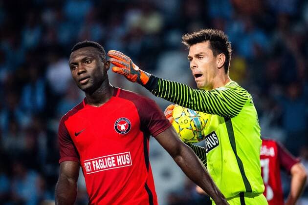 180823 Bubacarr Sanneh and goalkeeper Jesper Hansen of Midtjylland during the UEFA Europe League qualifying match between Malmö FF and Midtjylland on August 23, 2018 in Malmö Photo Ludvig Thunman BILDBYR N code LT 35525  Copyright: LUDVIGxTHUNMAN BB180823LT064