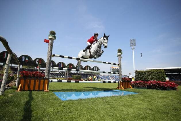 18 23 d3343 Laura KRAUT USA CONFU HOLST 2018 07 20 13 57 13h CHIO AACHEN World Equestrian Festival Aachen Aachen Soers Germany S10 North Rhine Westphalia Jumping Competition with 2 circuits Jumping Competition over two rounds Equestrian Jumping