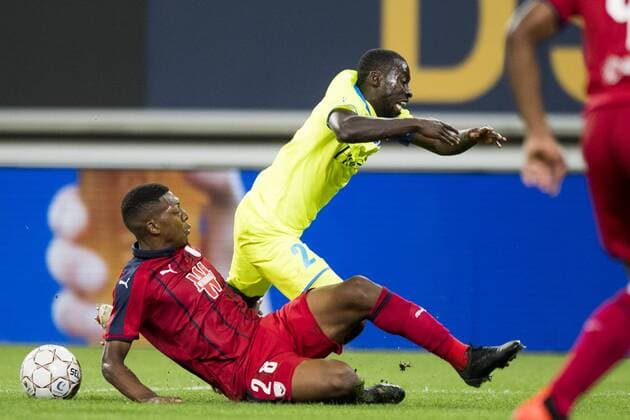 Bordeaux s Zaydou Youssouf and Gent s Nana Asare fight for the ball during a soccer game between Belgian club KAA Gent and French team FC Girondins de Bordeaux, Thursday 23 August 2018 in Gent, the first leg of the play off for the UEFA Europa League competition. JASPERxJACOBS  x05411794x