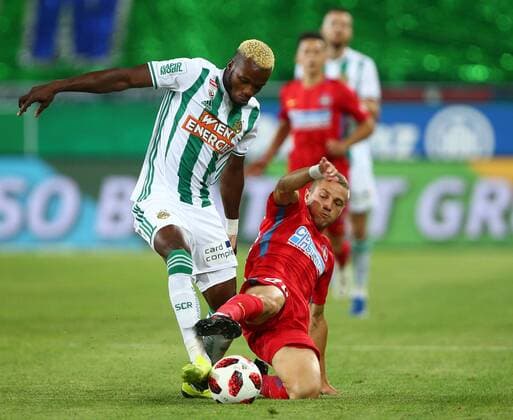 23 08 2018 Allianz Stadion Wien AUT UEFA SK Rapid Wien vs. Steaua Bucharest Qualification Play Off First leg of the match Boli Bolingoli Mbombo SK Rapid Wien and Mihai Roman FCSB during the UEFA Europa League SK Rapid Vienna and Steaua Bucharestat at the Allianz Arena Vienna Austria on 2018 08 23 EXPA Pictures 2018 PhotoCredit EXPA Thomas Haumer Vienna  EX_THA