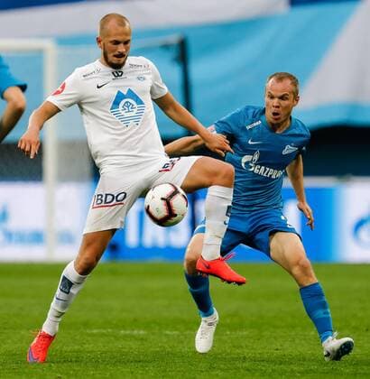 August 23, 2018 - Saint Petersburg, Russia - Aleksandr Anyukov (R) of FC Zenit Saint Petersburg and Eirik Hestad of Molde FK vie for the ball during the UEFA Europa League play-offs first leg match between FC Zenit Saint Petersburg and Molde FK on August 23, 2018 at Saint Petersburg Stadium in Saint Petersburg, Russia. Zenit Saint Petersburg v Molde FK - UEFA Europa League: Play-offs  - ZUMAn230 20180823_zaa_n230_141 Copyright: xMikexKireevx