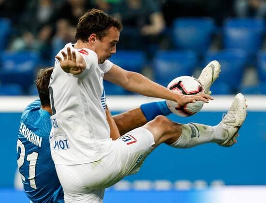 August 23, 2018 - Saint Petersburg, Russia - Aleksandr Erokhin (L) of FC Zenit Saint Petersburg and Vegard Forren of Molde FK vie for the ball during the UEFA Europa League play-offs first leg match between FC Zenit Saint Petersburg and Molde FK on August 23, 2018 at Saint Petersburg Stadium in Saint Petersburg, Russia. Zenit Saint Petersburg v Molde FK - UEFA Europa League: Play-offs  - ZUMAn230 20180823_zaa_n230_175 Copyright: xMikexKireevx
