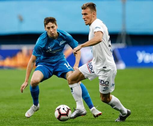 August 23, 2018 - Saint Petersburg, Russia - Daler Kuzyaev (L) of FC Zenit Saint Petersburg and Christoffer Remmer of Molde FK vie for the ball during the UEFA Europa League play-offs first leg match between FC Zenit Saint Petersburg and Molde FK on August 23, 2018 at Saint Petersburg Stadium in Saint Petersburg, Russia. Zenit Saint Petersburg v Molde FK - UEFA Europa League: Play-offs  - ZUMAn230 20180823_zaa_n230_127 Copyright: xMikexKireevx