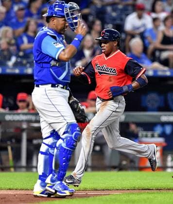 August 24, 2018 - Kansas City, MO, USA - The Cleveland Indians Greg Allen scores behind Kansas City Royals catcher Salvador Perez on a single by Michael Brantley in the third inning on Friday, Aug. 24, 2018, at Kauffman Stadium in Kansas City, Mo. Cleveland at Kansas City - ZUMAm67_ 20180824_zaf_m67_069 Copyright: xJohnxSleezerx